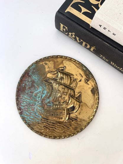 Vintage brass embossed pirate ship plate | vintage Halloween decor