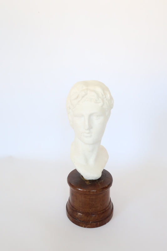 Greek sculpture on wooden base | vintage Greek god sculpture