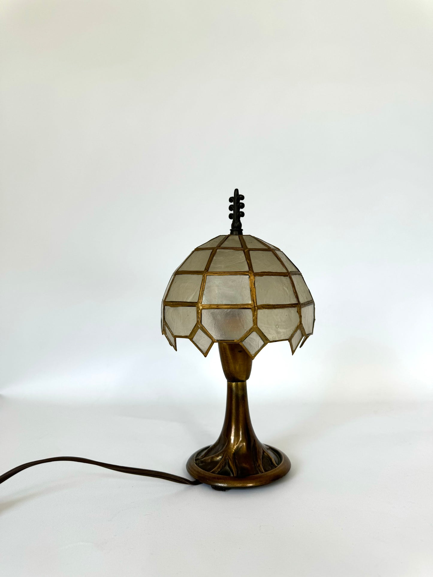 Bronzed stem vanity lamp with Capiz shell umbrella shade | vintage vanity decor