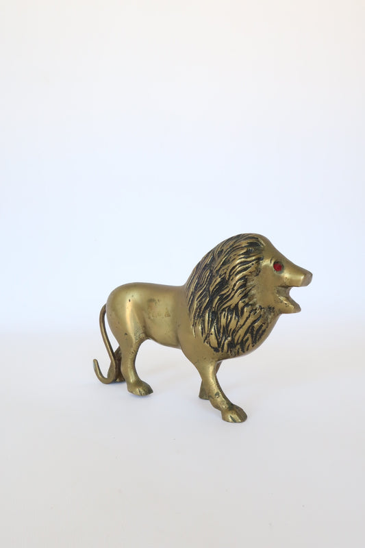 MCM brass lion sculpture w/ ruby red eyes