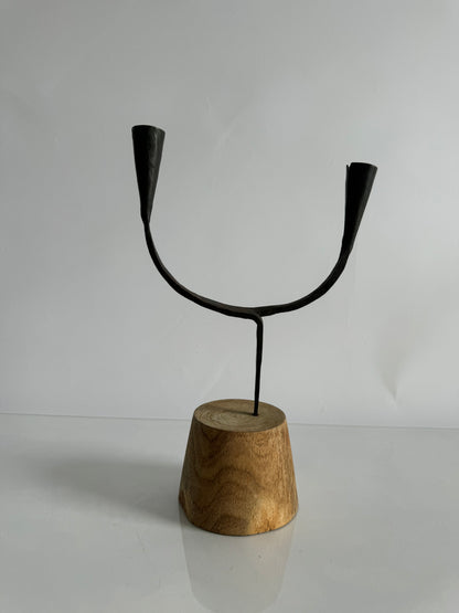 Forged metal taper candlestick holder on wood base