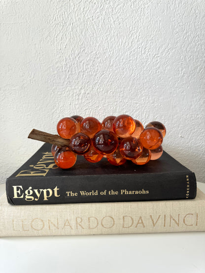 Peachy toned lucite grape cluster + wood stem