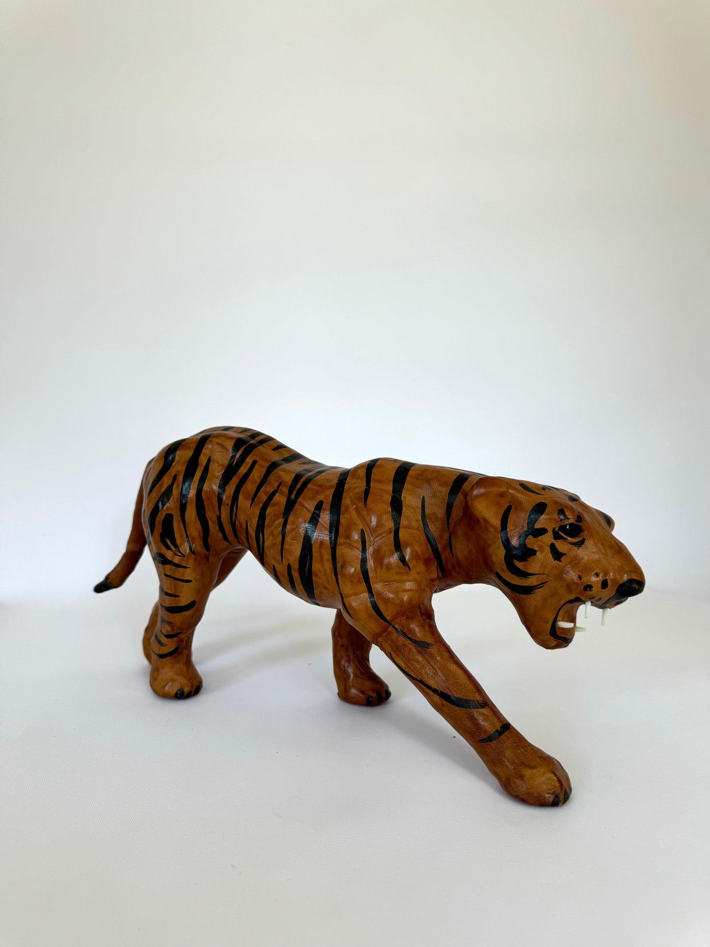 Vintage leather wrapped tiger statue