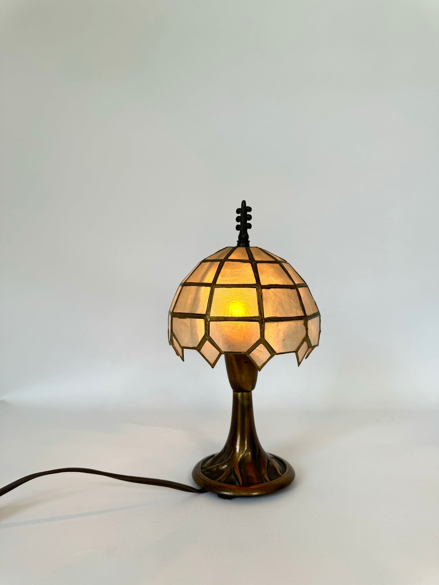 Bronzed stem vanity lamp with Capiz shell umbrella shade | vintage vanity decor